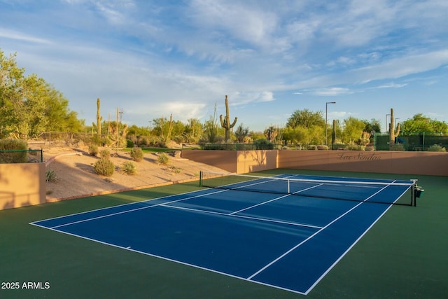 view of sport court featuring community basketball court and fence