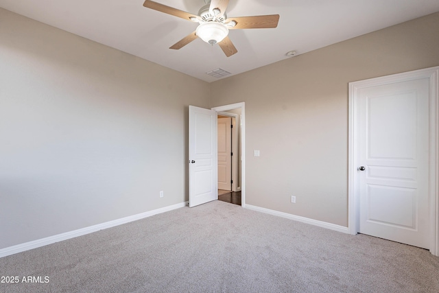 unfurnished bedroom featuring carpet floors and ceiling fan