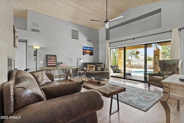 6249 E Camelot Dr, Mesa, AZ 85215 - living room with high vaulted ceiling, a ceiling fan, wood finished floors, and wooden ceiling