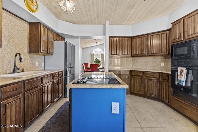 6249 E Camelot Dr, Mesa, AZ 85215 - kitchen featuring black appliances, wood ceiling, backsplash, a kitchen island, and light tile patterned floors