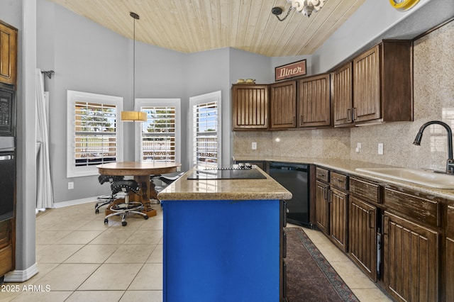 6249 E Camelot Dr, Mesa, AZ 85215 - kitchen featuring black appliances, wood ceiling, light tile patterned flooring, a center island, and tasteful backsplash