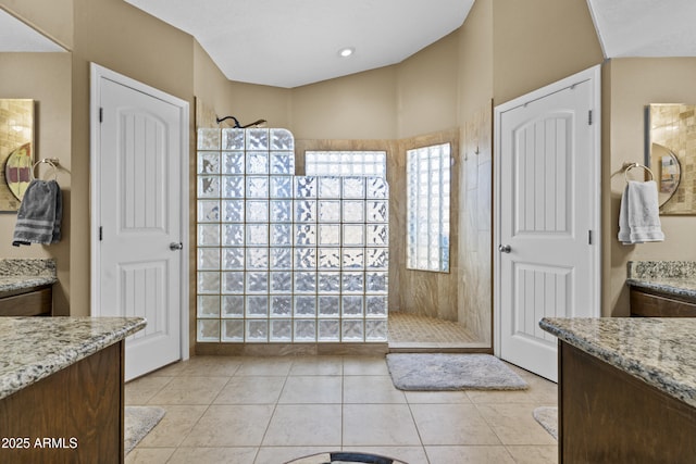 6249 E Camelot Dr, Mesa, AZ 85215 - full bathroom featuring a walk in shower, vanity, and tile patterned floors