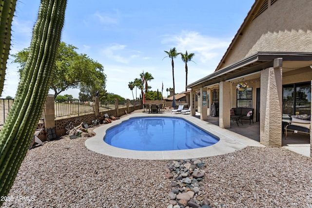 6249 E Camelot Dr, Mesa, AZ 85215 - view of swimming pool with a patio area, a fenced backyard, and an outdoor hangout area