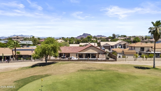 6249 E Camelot Dr, Mesa, AZ 85215 - surrounding community featuring a residential view, a putting area, a mountain view, and golf course view