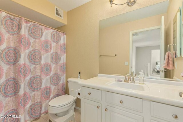 full bath with vanity, a shower with shower curtain, visible vents, tile patterned flooring, and toilet