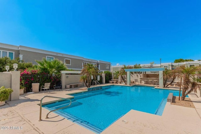 community pool with a patio