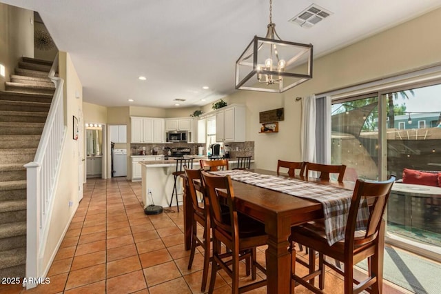 dining space featuring stairs, light tile patterned floors, recessed lighting, and visible vents