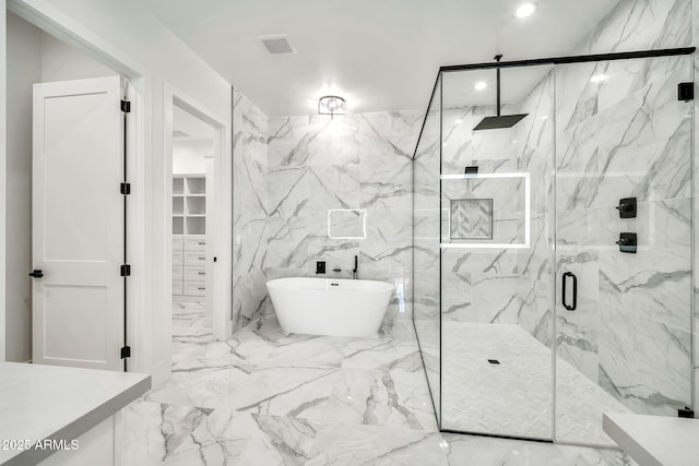 18225 W San Juan Ct, Litchfield Park, AZ 85340 - bathroom featuring a marble finish shower, marble tiled flooring, a freestanding bath, and a walk in closet