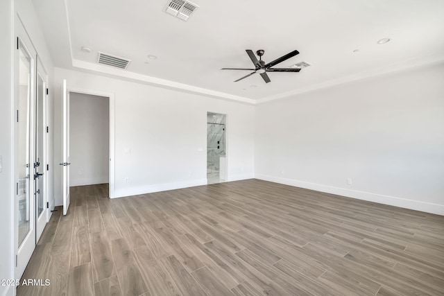18225 W San Juan Ct, Litchfield Park, AZ 85340 - spare room with a ceiling fan, baseboards, and wood finished floors