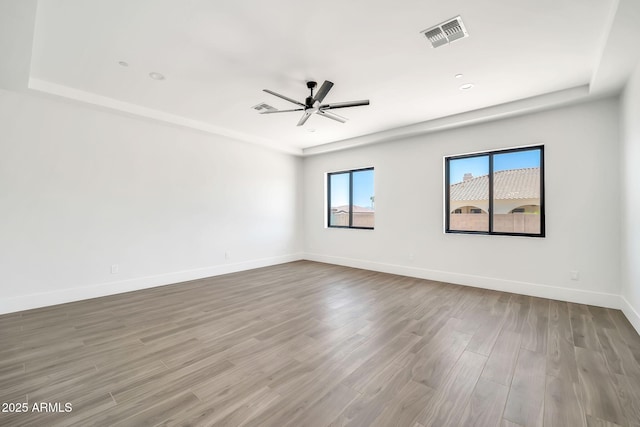 18225 W San Juan Ct, Litchfield Park, AZ 85340 - unfurnished room with ceiling fan, wood finished floors, baseboards, and recessed lighting