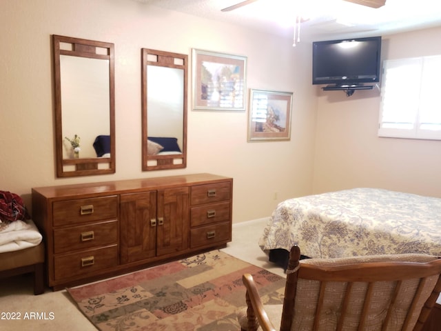 bedroom with light carpet