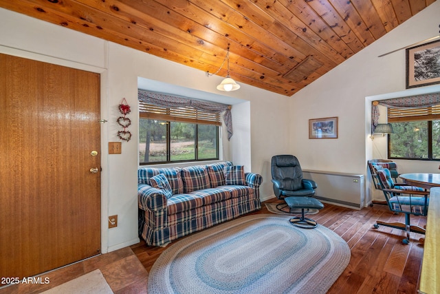 living room with hardwood / wood-style floors, lofted ceiling, and wood ceiling