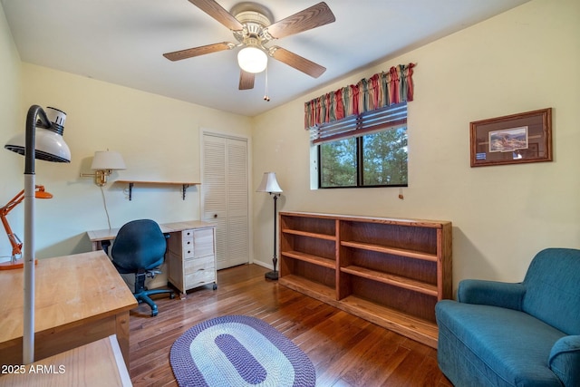 office area with ceiling fan and hardwood / wood-style flooring