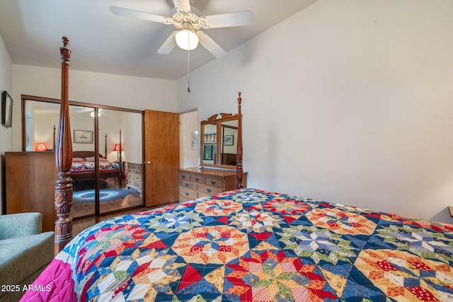 bedroom featuring ceiling fan, lofted ceiling, and a closet