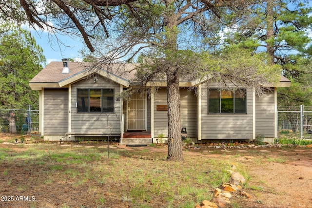 view of front of home with a front lawn