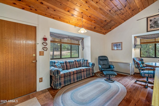 living room with hardwood / wood-style floors, wooden ceiling, and lofted ceiling