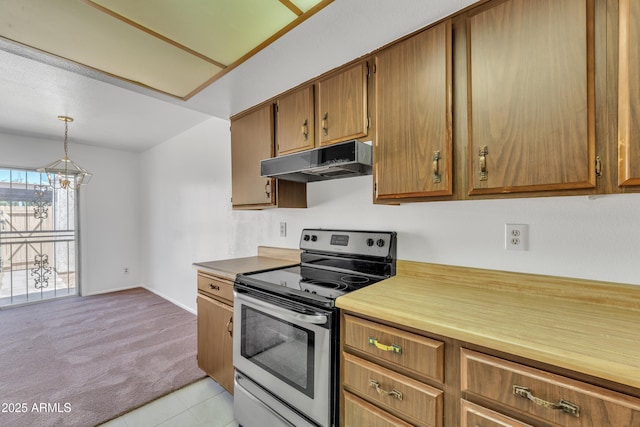 4836 W Rose Ln, Glendale, AZ 85301 - kitchen with a chandelier, light colored carpet, light countertops, electric range, and under cabinet range hood