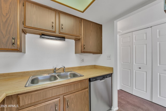 4836 W Rose Ln, Glendale, AZ 85301 - kitchen with light countertops, dishwasher, carpet, and a sink