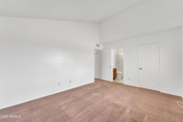 4836 W Rose Ln, Glendale, AZ 85301 - empty room featuring visible vents, light carpet, baseboards, and high vaulted ceiling
