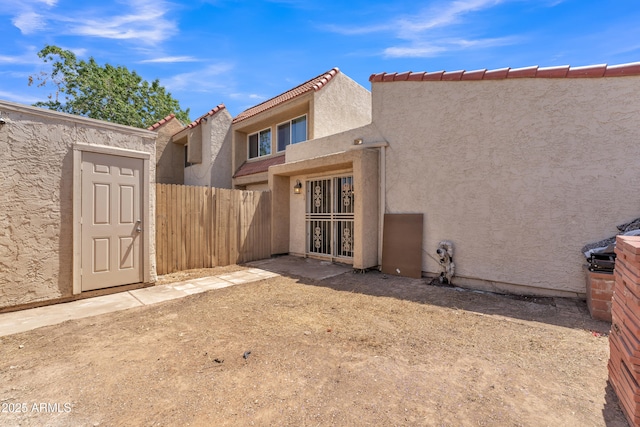 4836 W Rose Ln, Glendale, AZ 85301 - back of house featuring stucco siding and fence