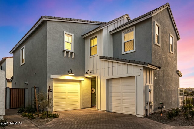 view of front of house with a garage