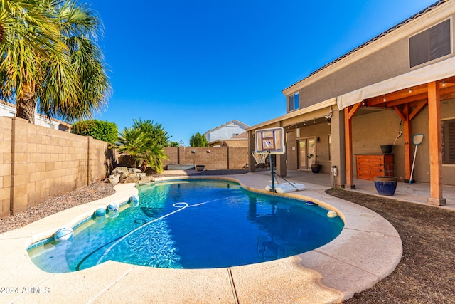 view of pool featuring a patio area