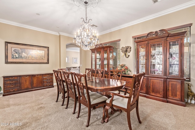 carpeted dining space featuring crown molding