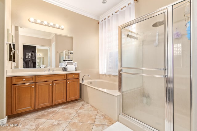 bathroom featuring vanity, independent shower and bath, crown molding, and tile patterned floors