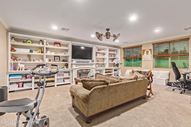 living room featuring crown molding and carpet floors