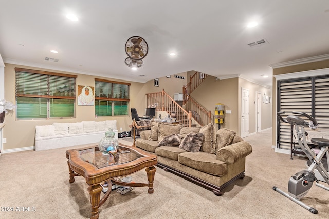 carpeted living room featuring ornamental molding