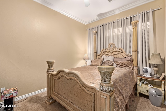 carpeted bedroom featuring ceiling fan and ornamental molding