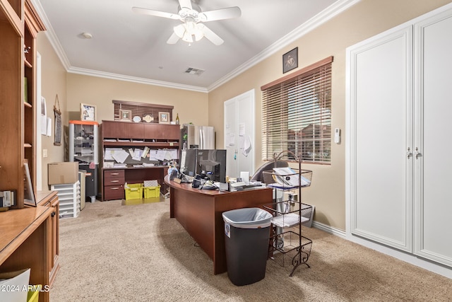 carpeted home office with ornamental molding and ceiling fan