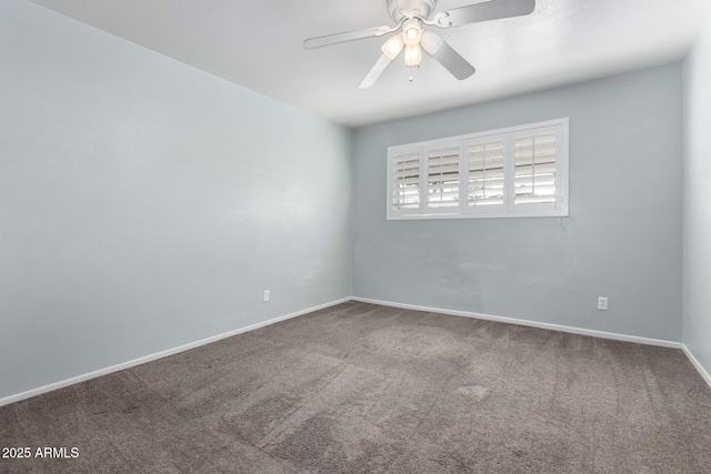 carpeted empty room featuring ceiling fan