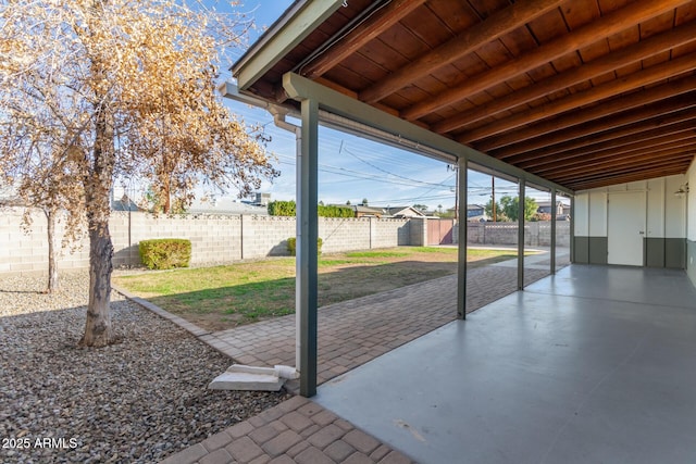 view of patio / terrace featuring a shed