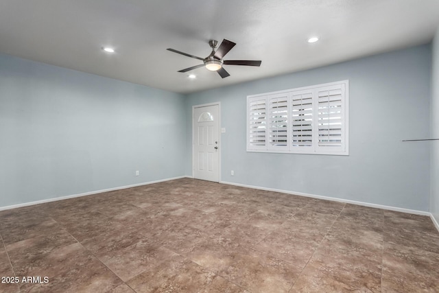 unfurnished room with ceiling fan