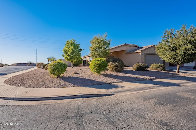 view of front of home with a garage