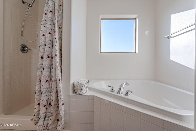 bathroom with plus walk in shower