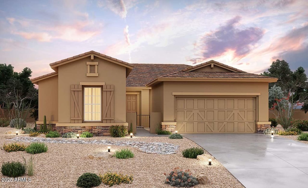 view of front of property featuring a garage