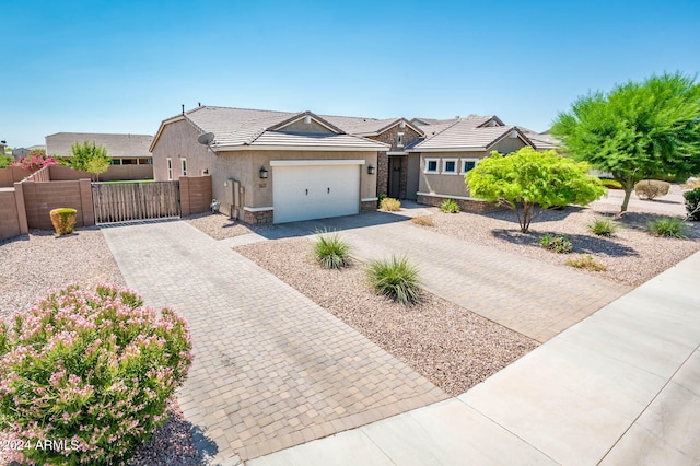 view of front of property with a garage