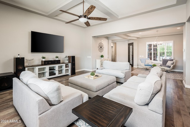 living room with ceiling fan with notable chandelier, beam ceiling, and dark hardwood / wood-style flooring