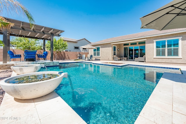 view of swimming pool featuring a pergola and a patio area