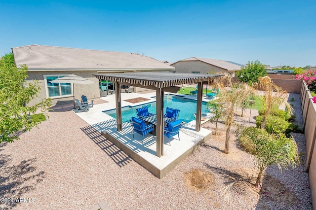 view of swimming pool with a patio