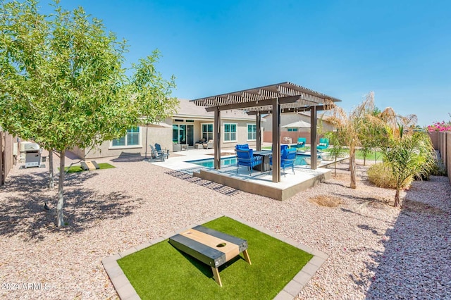 exterior space with a pergola and a patio area