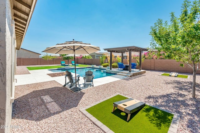 view of swimming pool with a pergola and a patio