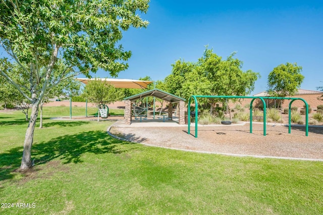 view of jungle gym with a lawn