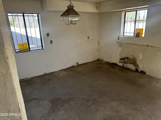 219 W Frye Rd, Chandler, AZ 85225 - spare room with a chandelier