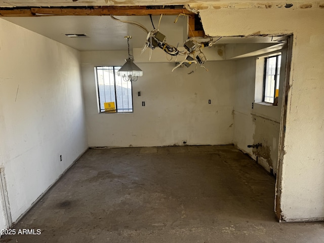 219 W Frye Rd, Chandler, AZ 85225 - spare room featuring unfinished concrete floors and healthy amount of natural light