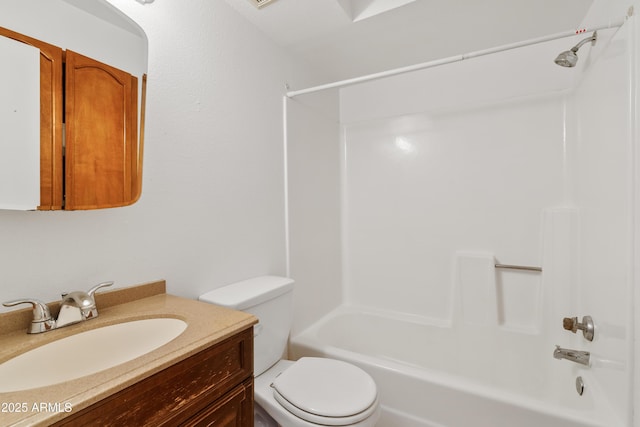 full bathroom featuring washtub / shower combination, toilet, and vanity