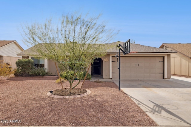 ranch-style house featuring a garage