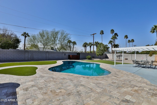 view of pool featuring a fenced in pool, a fenced backyard, and a patio